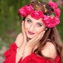 Woman with floral crown and glowing skin, symbolizing natural clean beauty